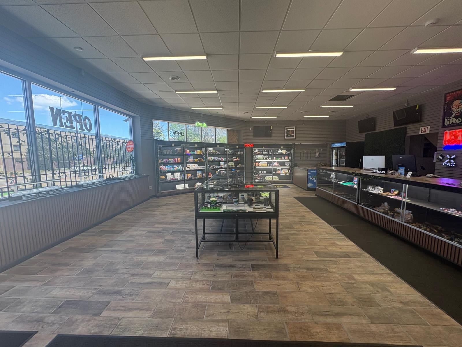 High Cloudz Buffalo interior — sunny front windows and accessories wall